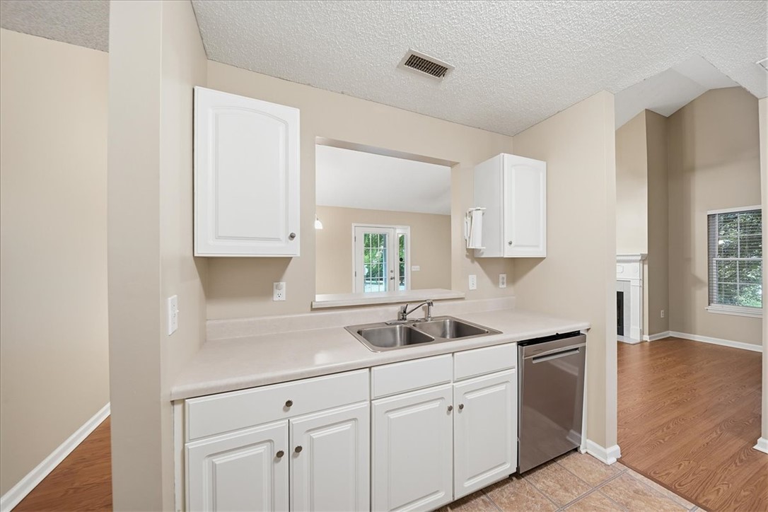 101 Grand Oak Circle Pendleton, SC 29670 - Photo 11 of 40 A well-appointed kitchen offers ample counter space and a convenient pass-through window to the adjacent room.