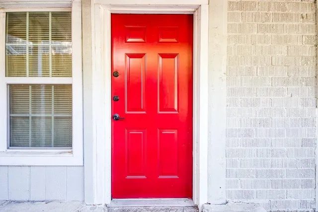 a view of a red door of a house
