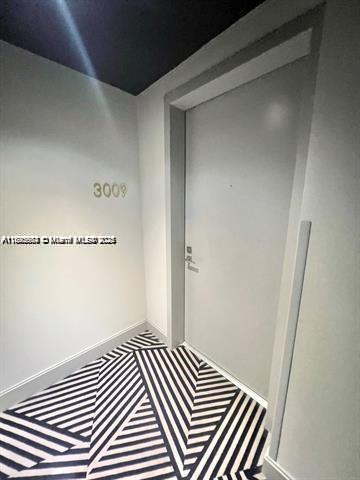 45 Southwest 9th Street, Unit 3009 Miami, FL 33130 - Photo 2 of 35 a view of a room with wooden floor