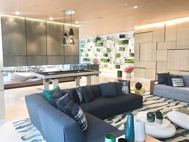 45 Southwest 9th Street, Unit 3009 Miami, FL 33130 - Photo 33 of 35 a living room with furniture and a bathroom