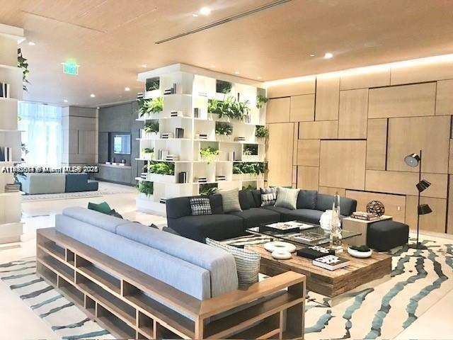 45 Southwest 9th Street, Unit 3009 Miami, FL 33130 - Photo 34 of 35 a living room with hard wood flooring and furniture