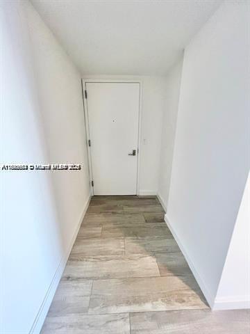 45 Southwest 9th Street, Unit 3009 Miami, FL 33130 - Photo 4 of 35 a view of a hallway