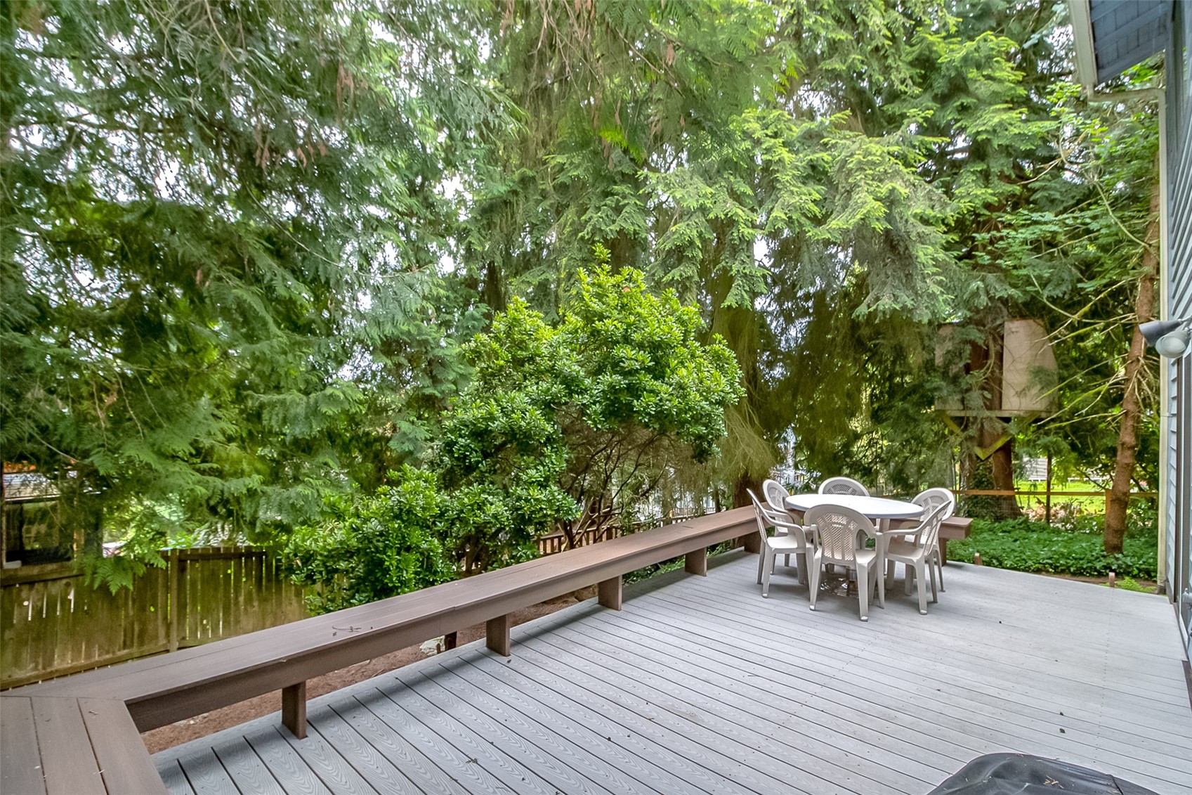 22121 4th Avenue Southeast Bothell, WA 98021 - Photo 2 of 22 a view of a chairs and table on the wooden deck