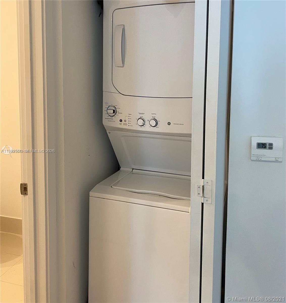 55 Southwest 9th Street, Unit 3709 Miami, FL 33130 - Photo 6 of 52 a utility room with dryer and washer