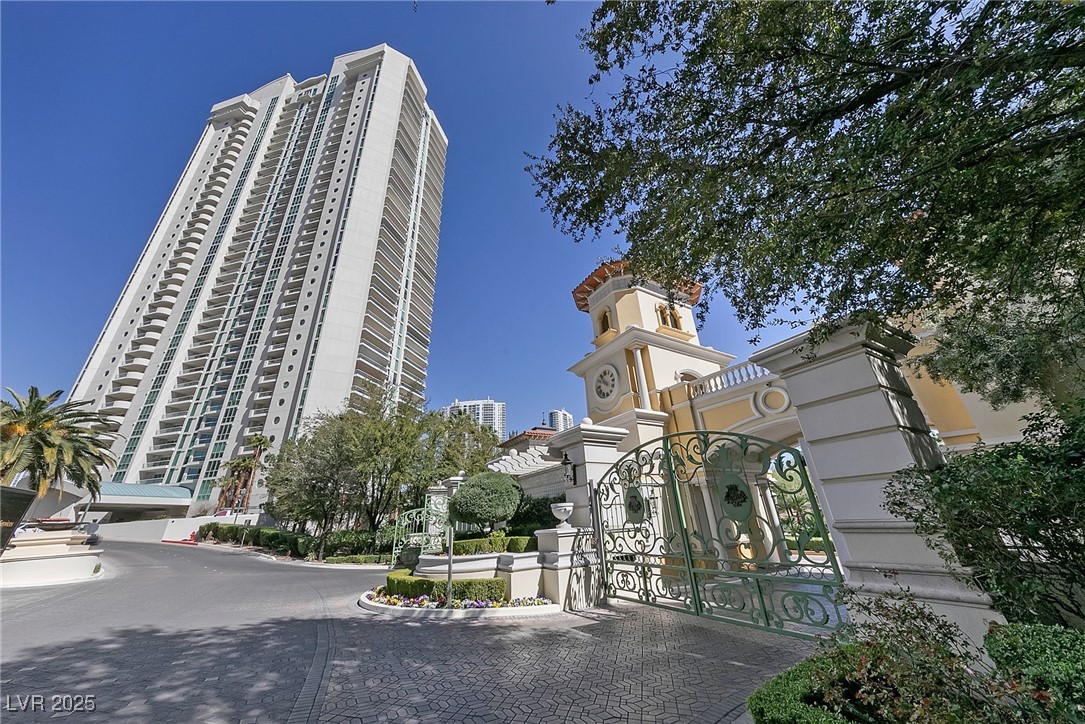 View of property featuring driveway