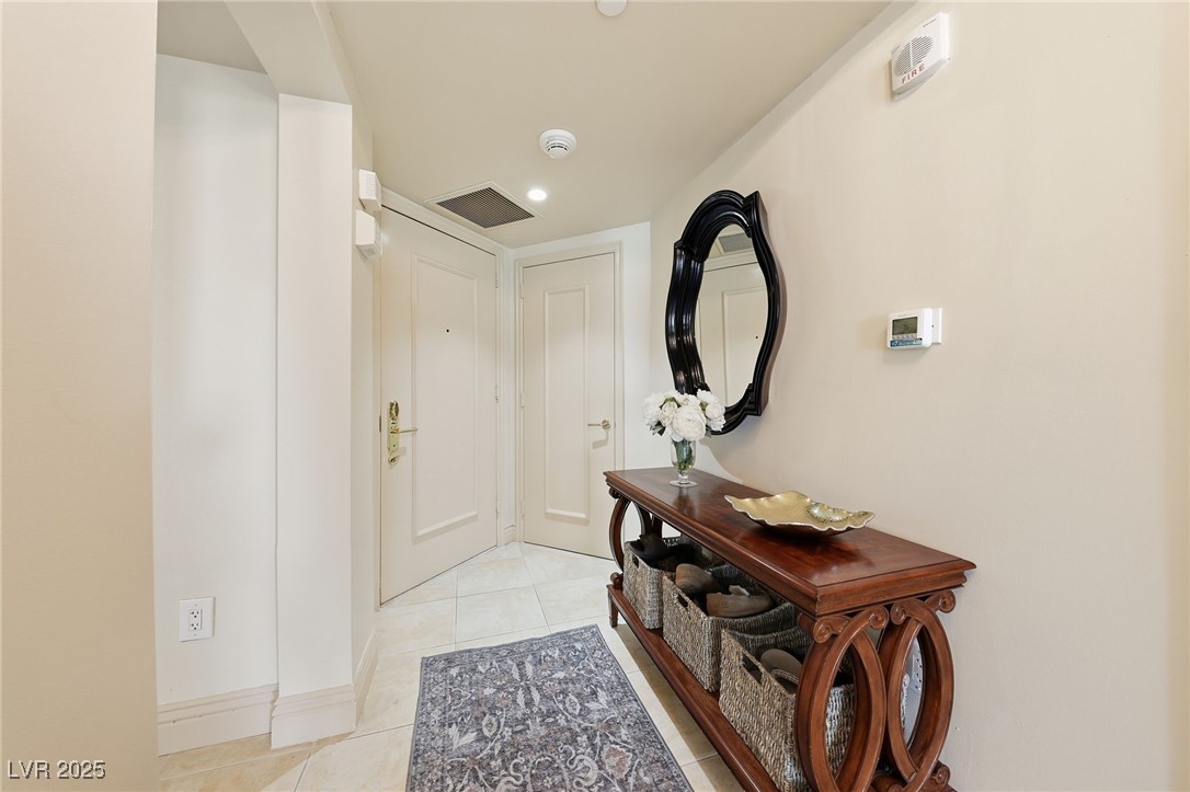 2747 Paradise Road, Unit 1205 Las Vegas, NV 89109 - Photo 2 of 32 Entrance foyer featuring light tile patterned flooring and recessed lighting