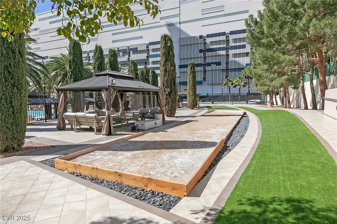 2747 Paradise Road, Unit 1205 Las Vegas, NV 89109 - Photo 24 of 32 View of property's community with a patio, a gazebo, and an outdoor living space