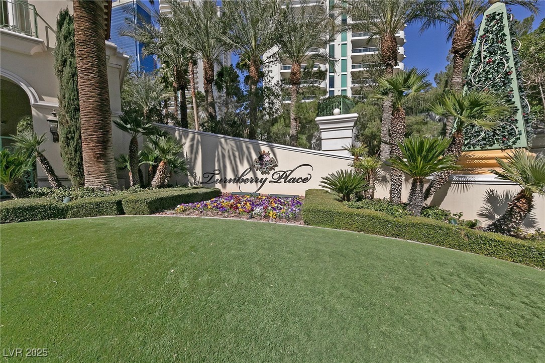 2747 Paradise Road, Unit 1205 Las Vegas, NV 89109 - Photo 32 of 32 Community sign featuring a yard