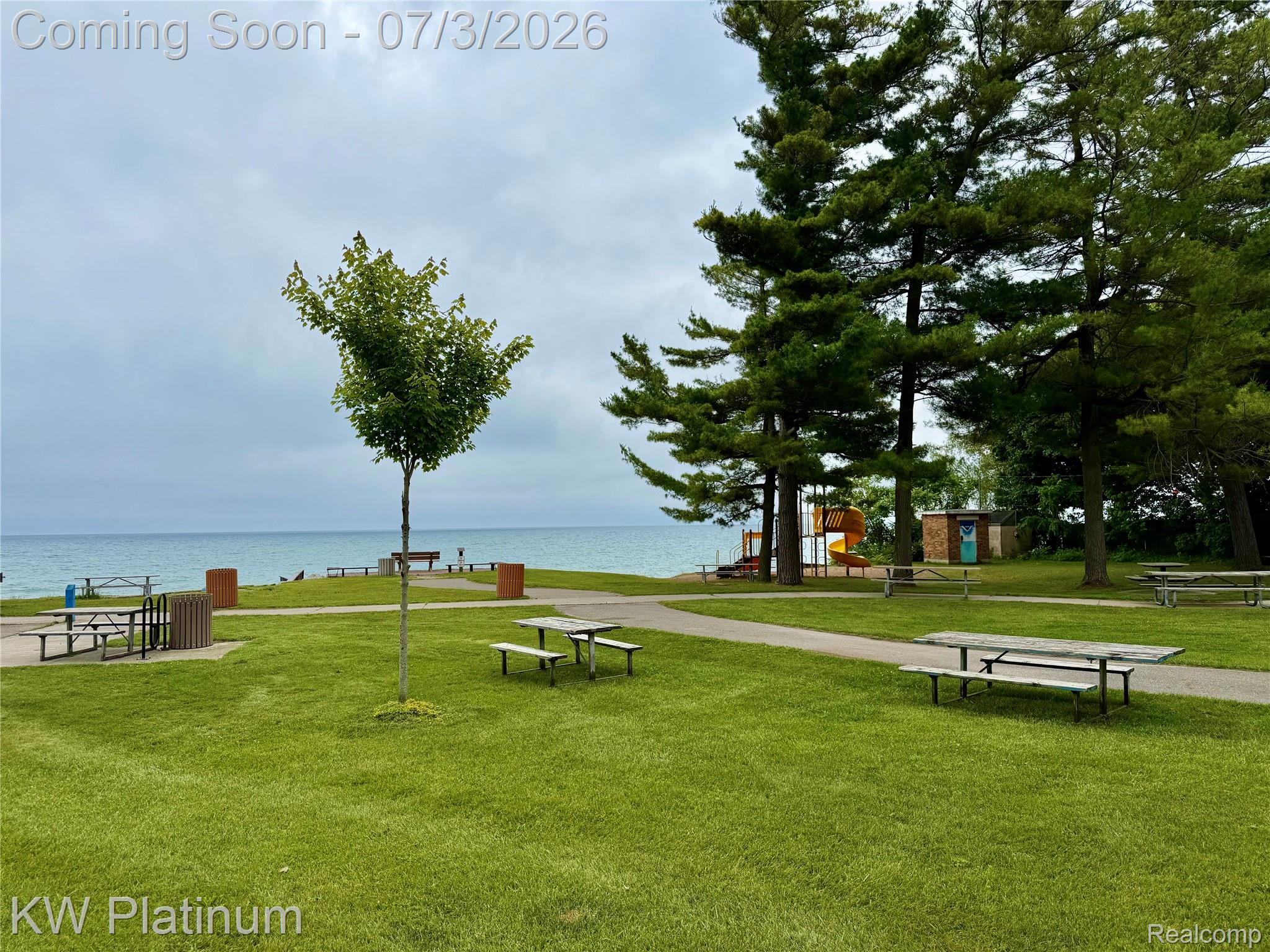 7955 Lakeshore Road Fort Gratiot, MI 48059 - Photo 28 of 30 Expansive green space featuring manicured lawns and mature trees