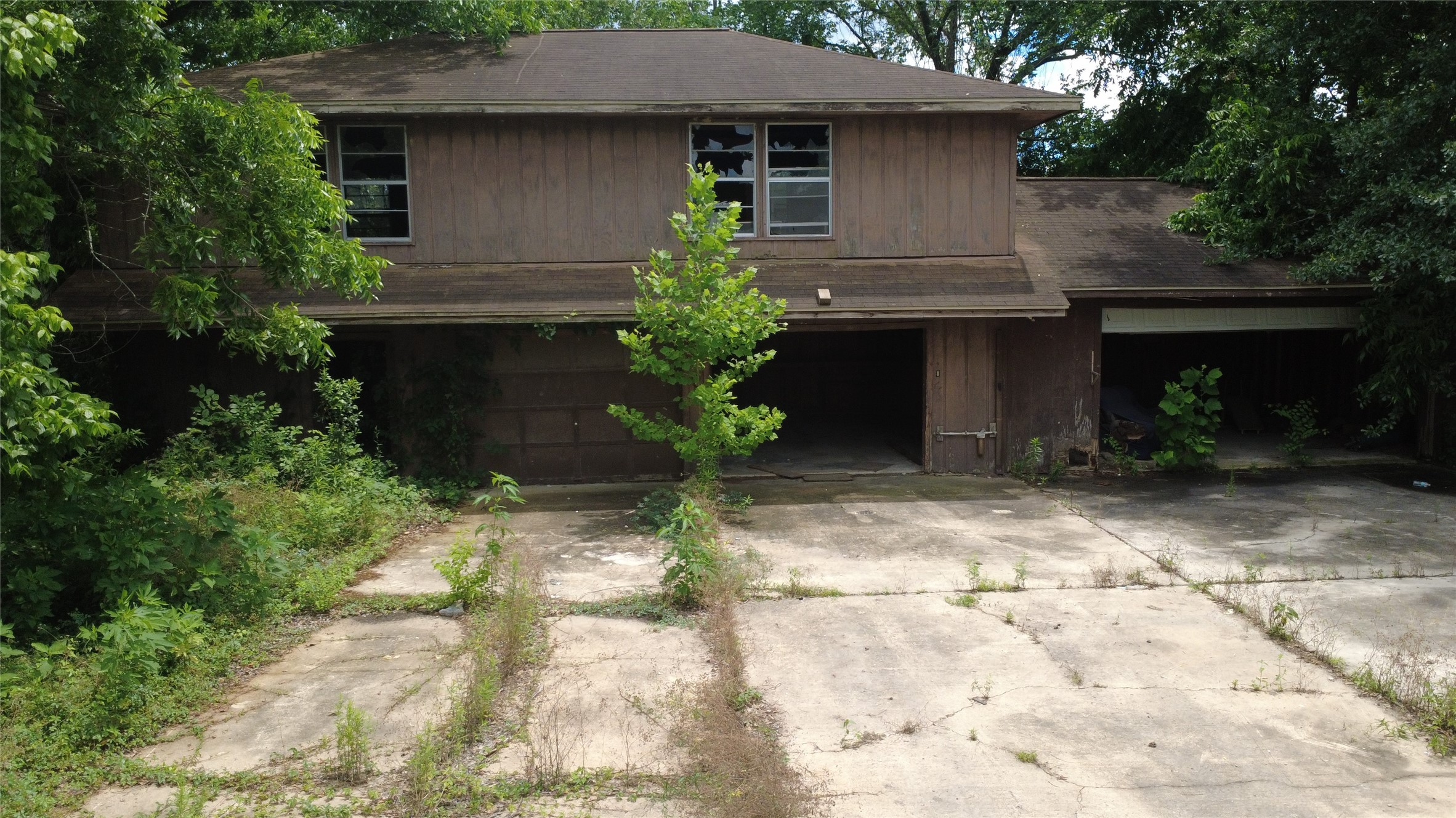 11921 Gloger Street Houston, TX 77039 - Photo 5 of 5 a front view of a house with a yard
