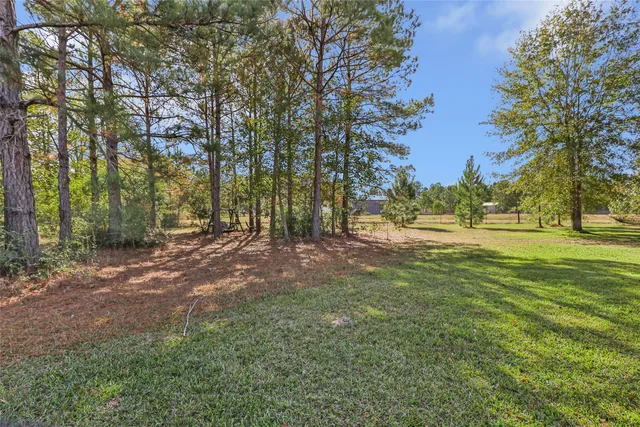$599,900 | 9006 Water Buck Lane, Conroe, TX 77303