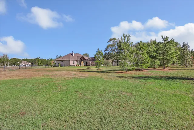 $599,900 | 9006 Water Buck Lane, Conroe, TX 77303