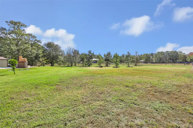 $599,900 | 9006 Water Buck Lane, Conroe, TX 77303