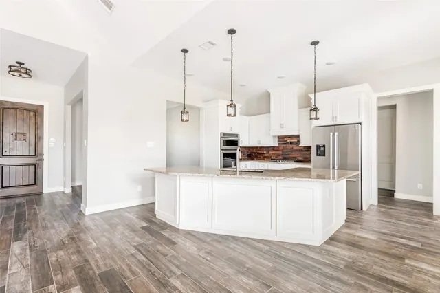 $599,900 | 9006 Water Buck Lane, Conroe, TX 77303