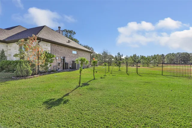$599,900 | 9006 Water Buck Lane, Conroe, TX 77303