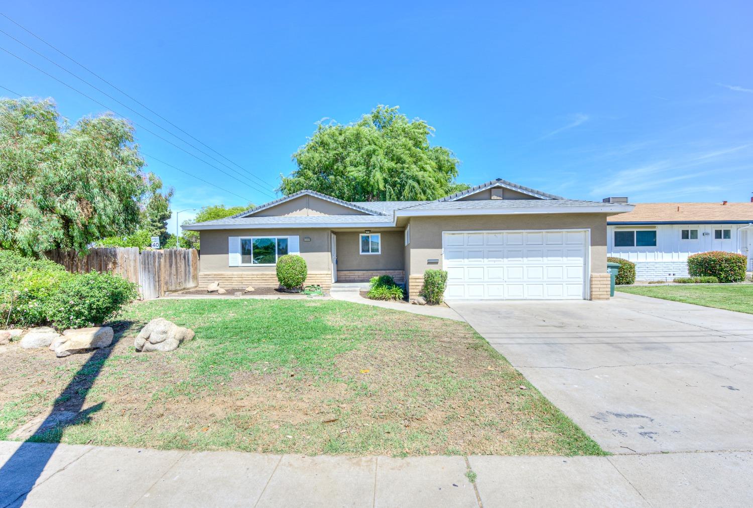 front view of a house and a yard