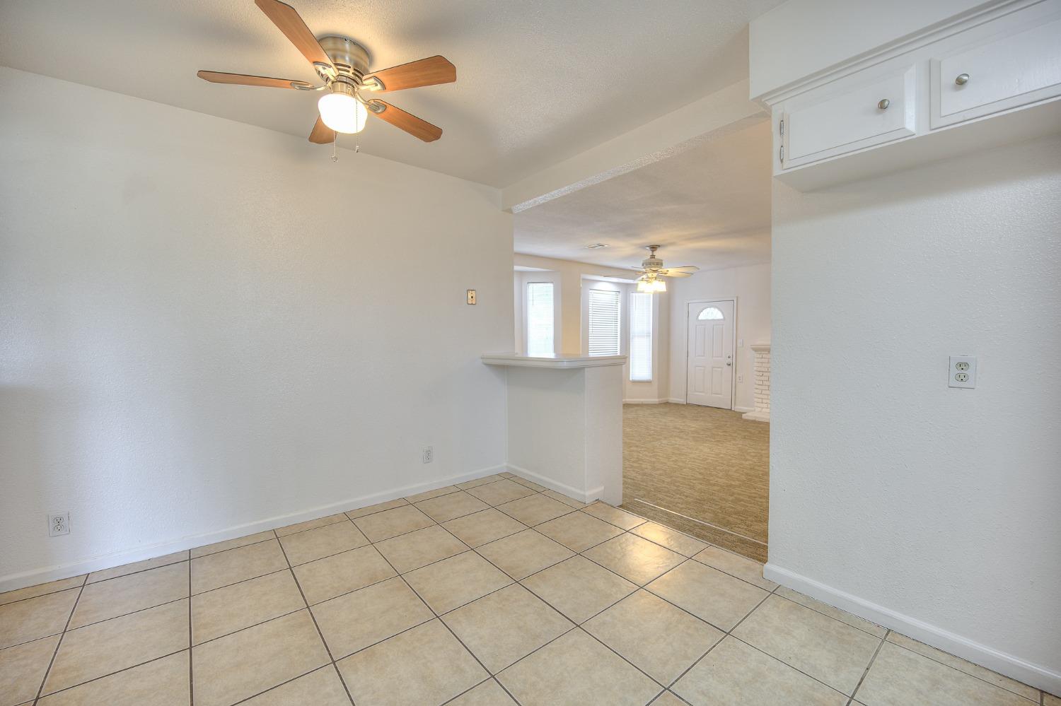 2811 North Winery Avenue Clovis, CA 93612 - Photo 12 of 25 a view of an empty room and window