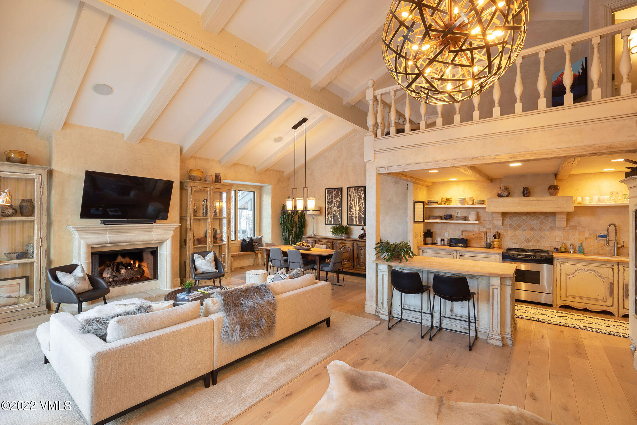 1328 Vail Valley Drive Vail, CO 81657 - Photo 5 of 13 a living room with fireplace furniture and a flat screen tv