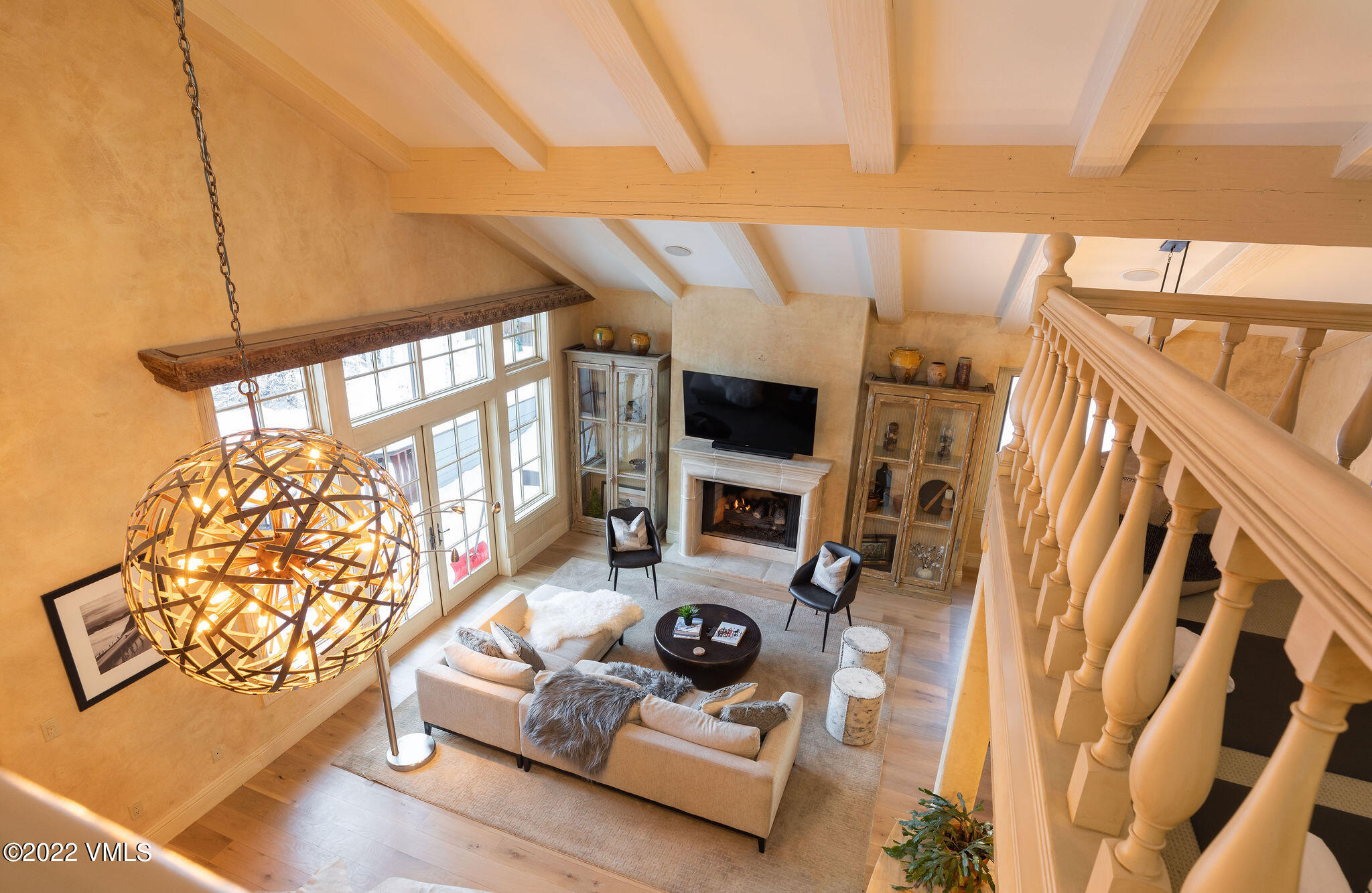 1328 Vail Valley Drive Vail, CO 81657 - Photo 6 of 13 a living room with furniture and a flat screen tv