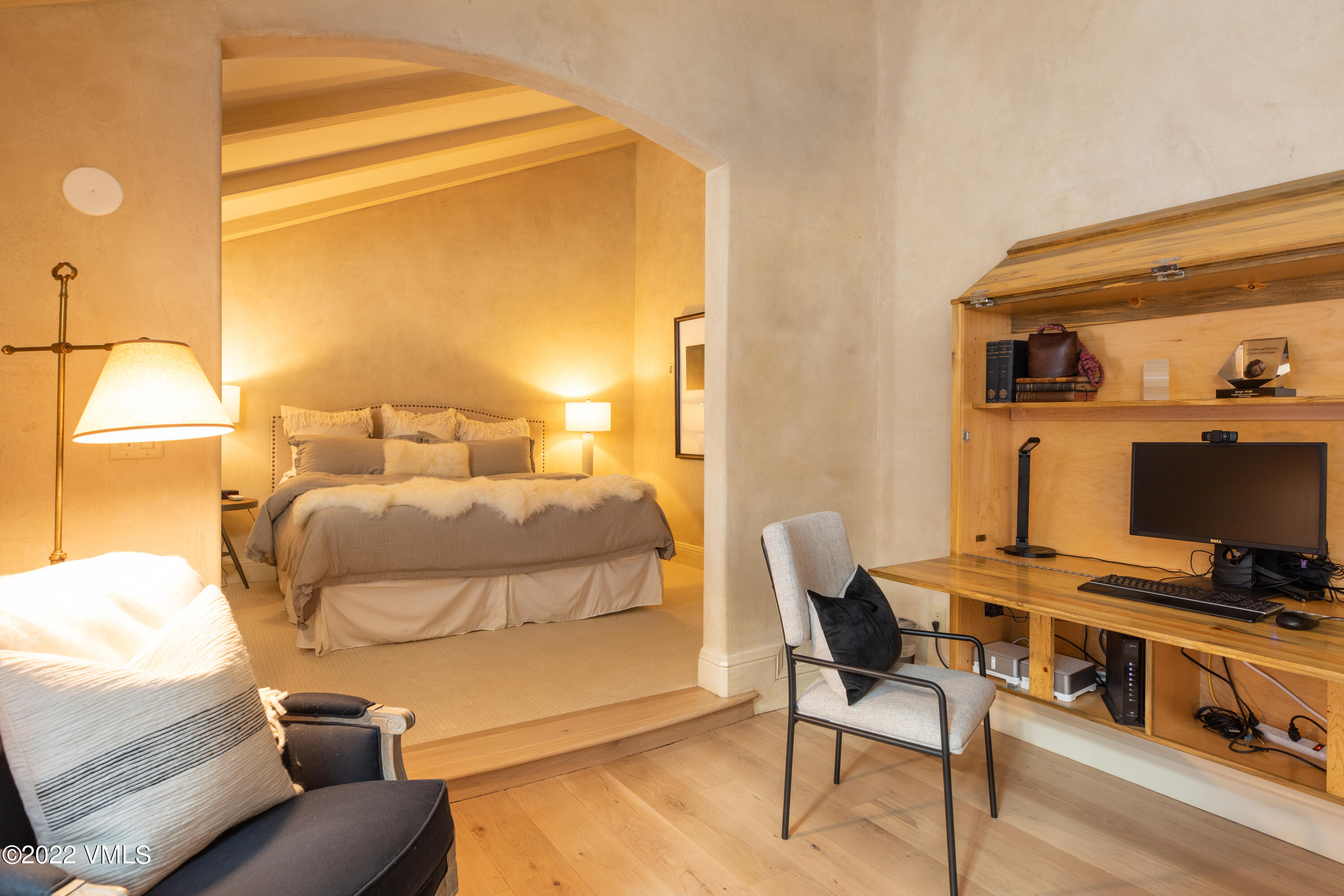 1328 Vail Valley Drive Vail, CO 81657 - Photo 8 of 13 a bedroom with a bed and a flat screen tv