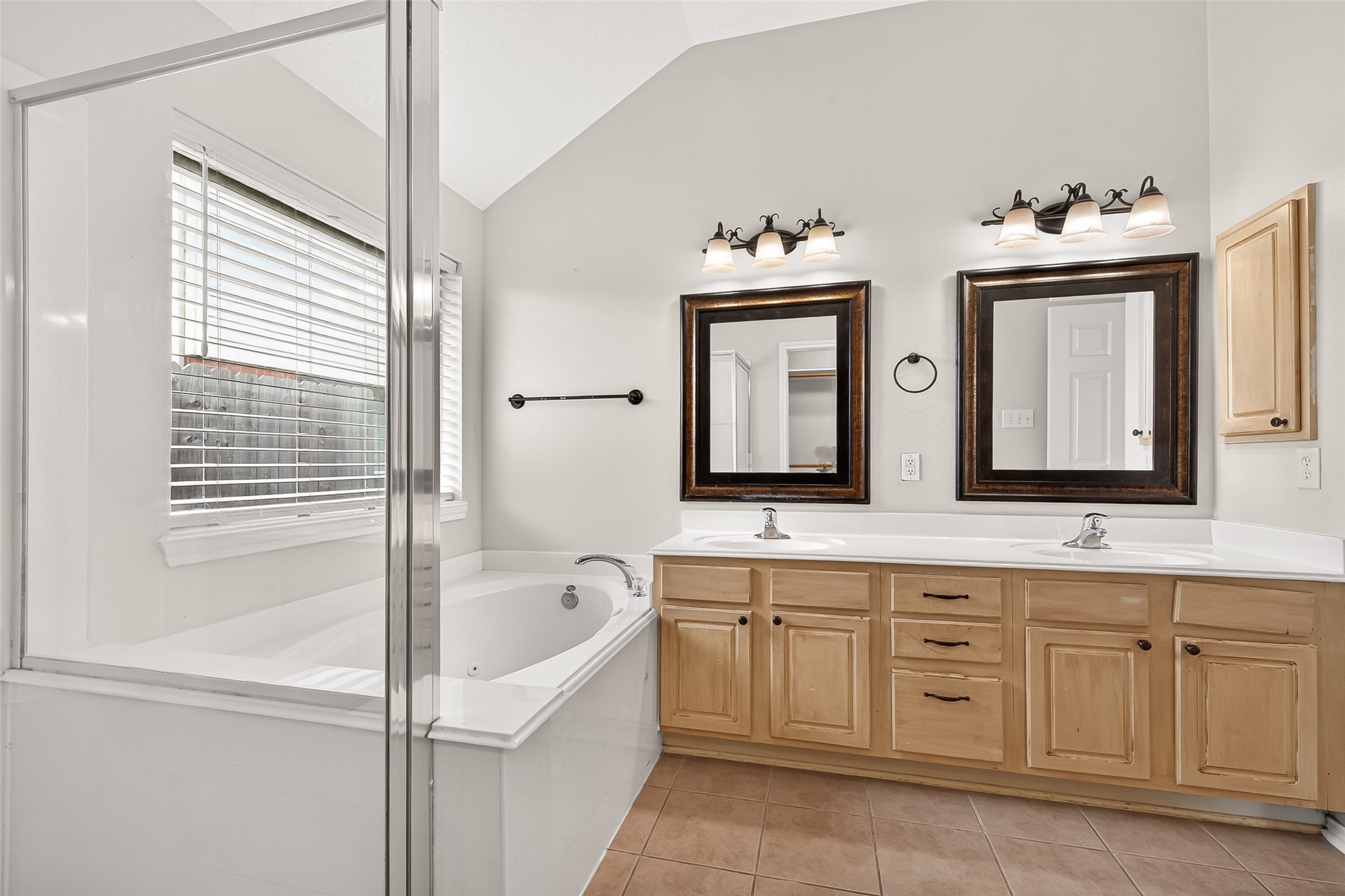 5517 Autumn Ash Lane Rosharon, TX 77583 - Photo 32 of 50 a spacious bathroom with 2 sink tub and a mirror