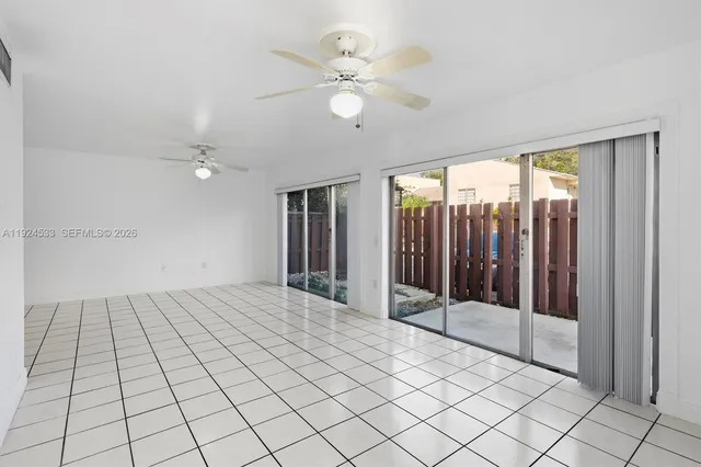 a view of an empty room and window