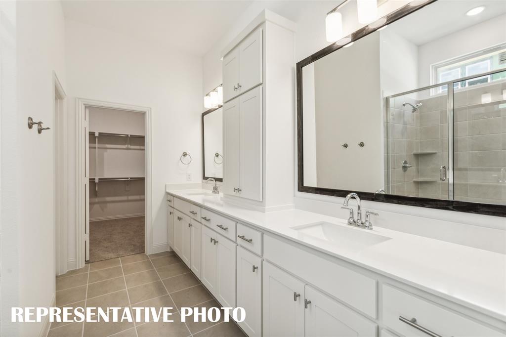 1034 Splitrock Drive Allen, TX 75013 - Photo 9 of 18 a bathroom with a double vanity sink mirror and double
