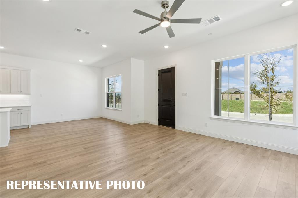 1034 Splitrock Drive Allen, TX 75013 - Photo 2 of 18 a view of an empty room with a window