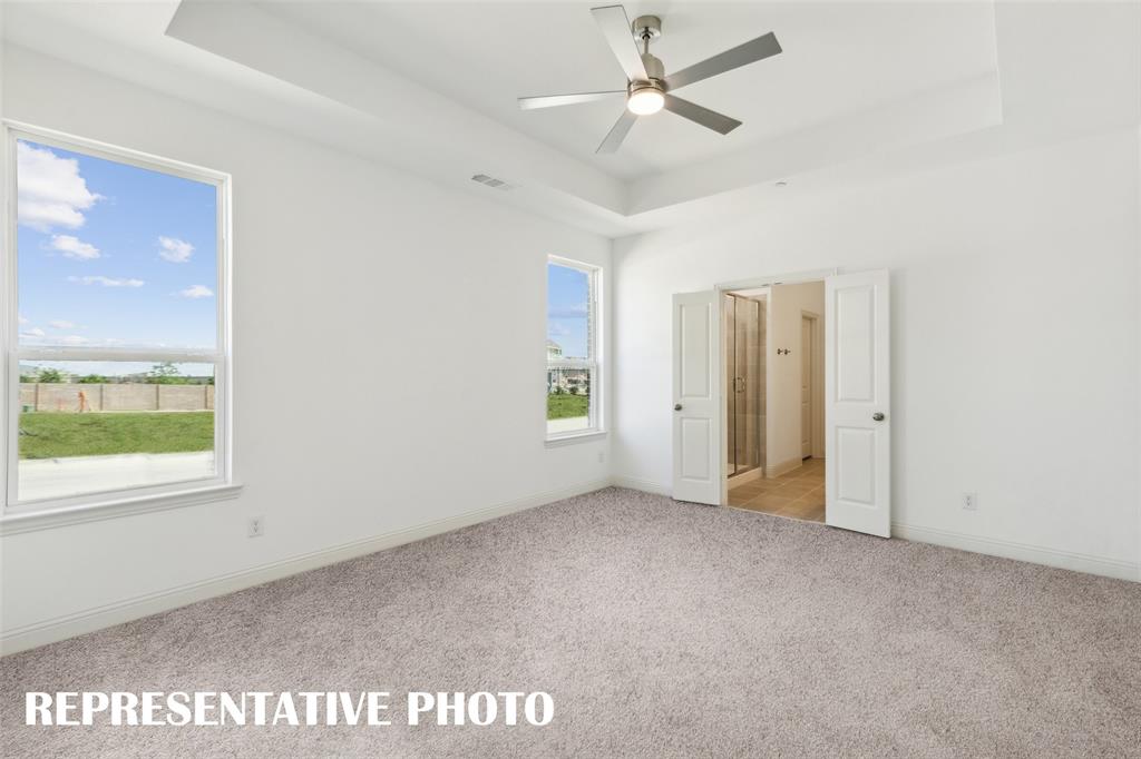 1034 Splitrock Drive Allen, TX 75013 - Photo 8 of 18 a view of an empty room with a window