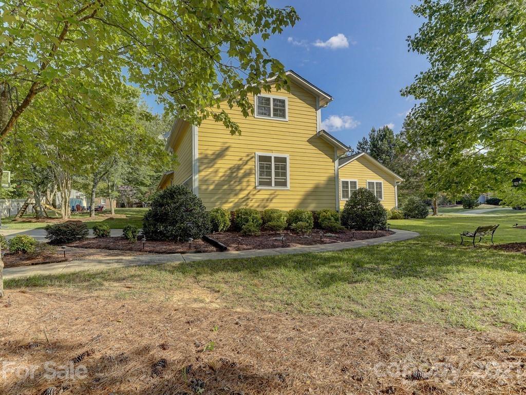1520 Cobblestone Court Fort Mill, SC 29708 - Photo 3 of 47 a front view of a house with a yard