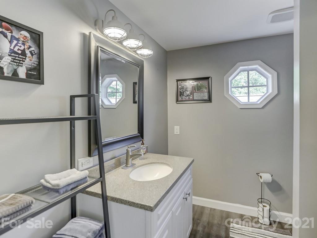 1520 Cobblestone Court Fort Mill, SC 29708 - Photo 32 of 47 a bathroom with a sink and a mirror