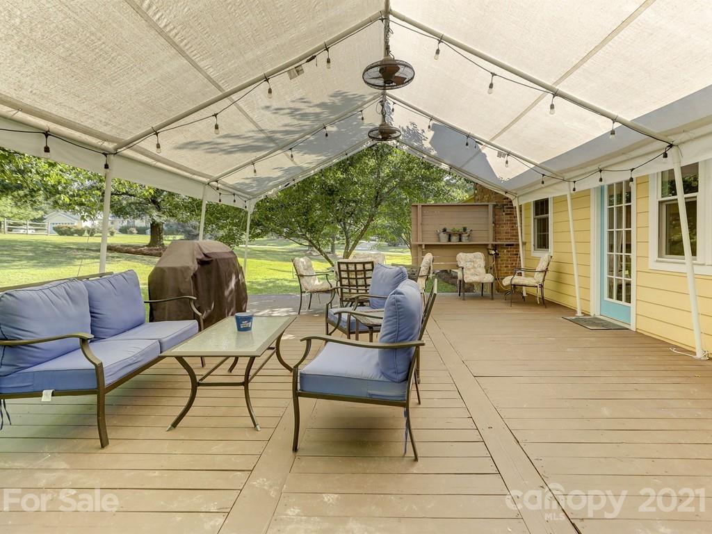 1520 Cobblestone Court Fort Mill, SC 29708 - Photo 41 of 47 a view of a terrace with furniture and a yard