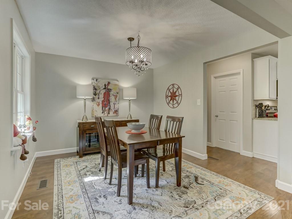 1520 Cobblestone Court Fort Mill, SC 29708 - Photo 6 of 47 a view of a dining room with furniture