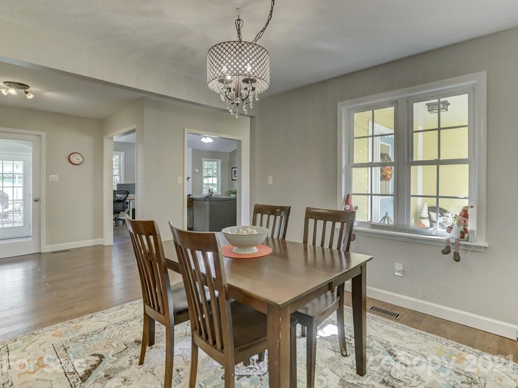 1520 Cobblestone Court Fort Mill, SC 29708 - Photo 7 of 47 a view of a dining room with furniture window and wooden floor
