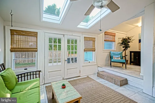 a bathroom with a sink vanity and a mirror