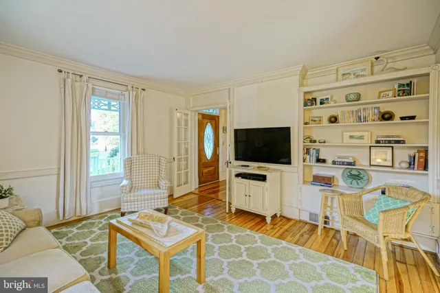 a bed room with a bed and a window