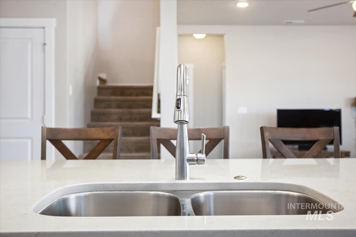 3729 South Maple Ridge Avenue Nampa, ID 83686 - Photo 15 of 46 Kitchen featuring light stone countertops and recessed lighting