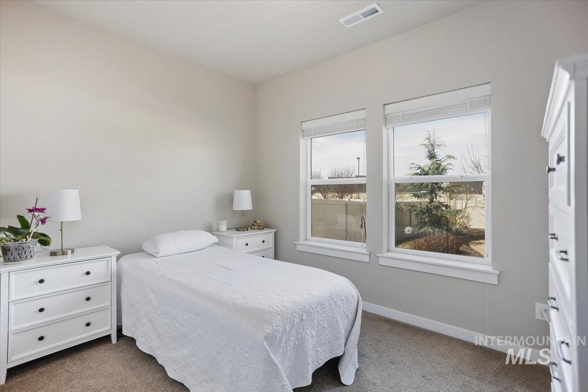 3729 South Maple Ridge Avenue Nampa, ID 83686 - Photo 17 of 46 Carpeted bedroom with baseboards