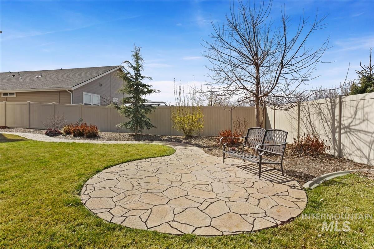 3729 South Maple Ridge Avenue Nampa, ID 83686 - Photo 40 of 46 Fenced backyard featuring a patio area