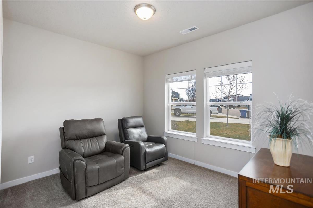 3729 South Maple Ridge Avenue Nampa, ID 83686 - Photo 7 of 46 bedroom featuring light colored carpet