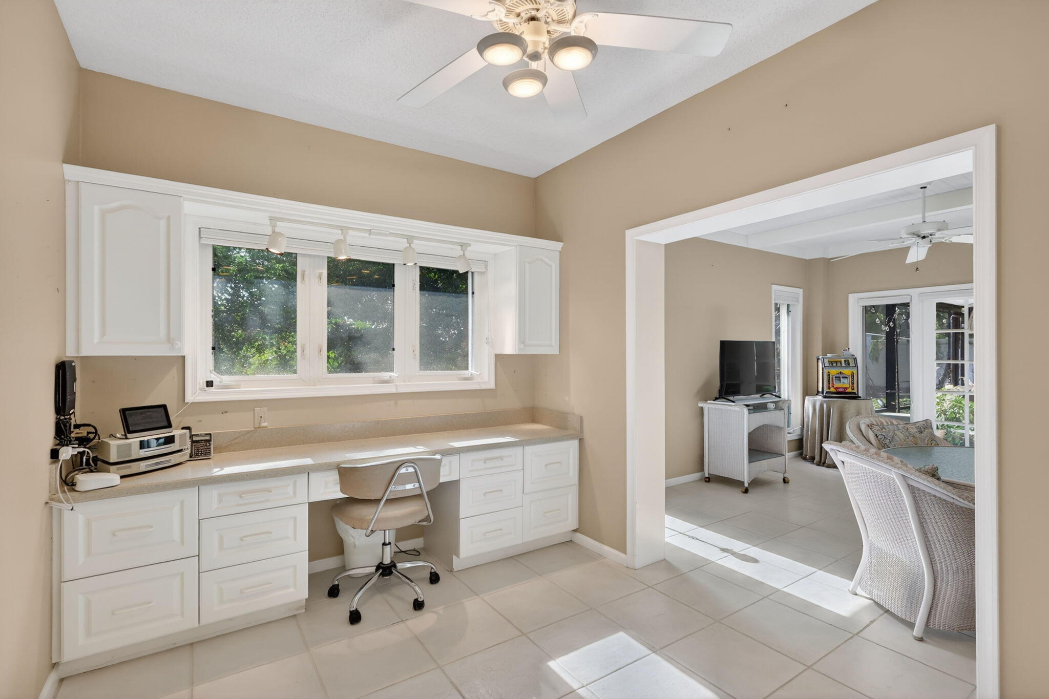 5422 Southeast Meredith Terrace Stuart, FL 34997 - Photo 18 of 56 a living room with furniture and a large window