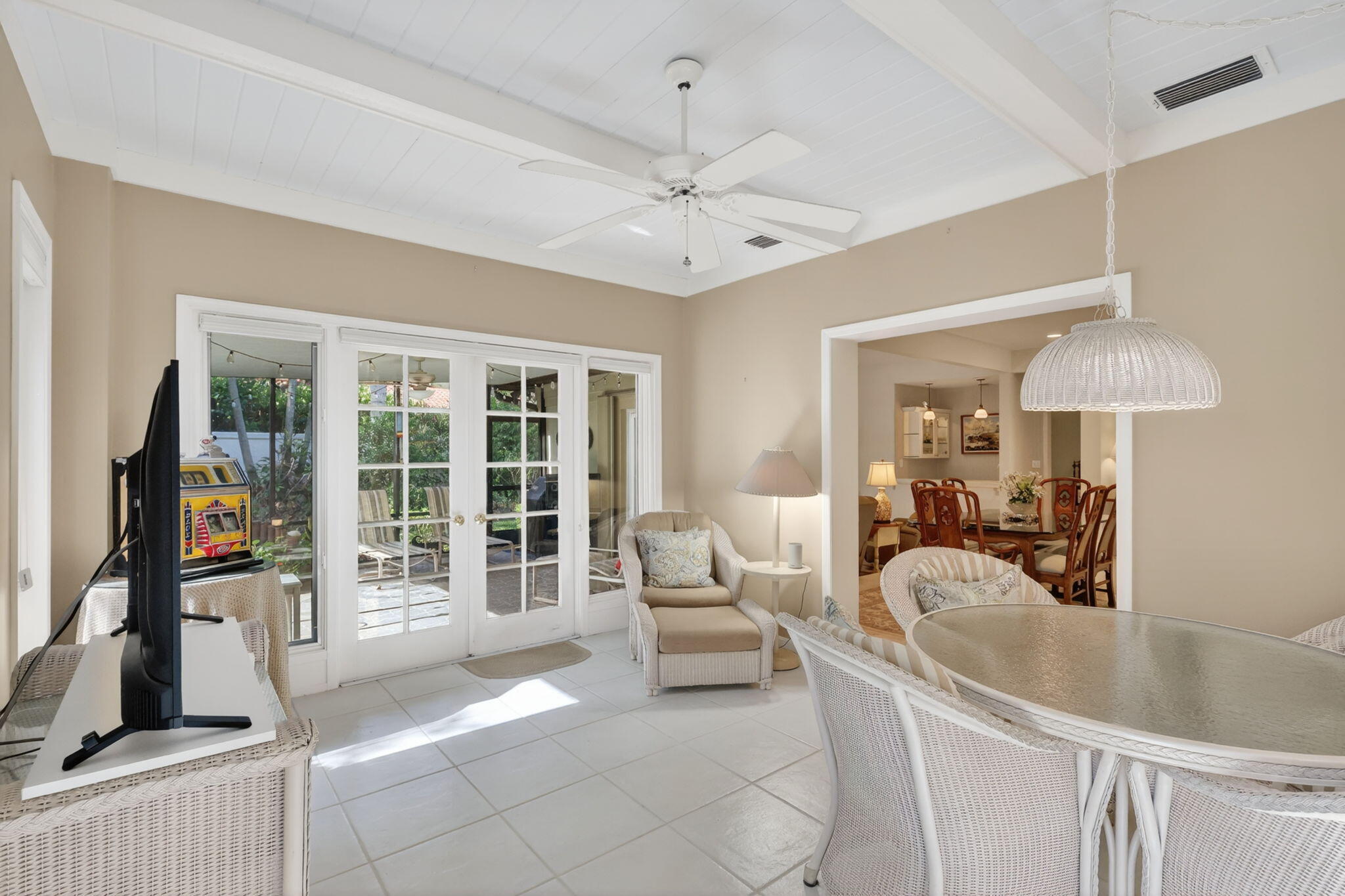 5422 Southeast Meredith Terrace Stuart, FL 34997 - Photo 19 of 56 a living room with furniture and a chandelier