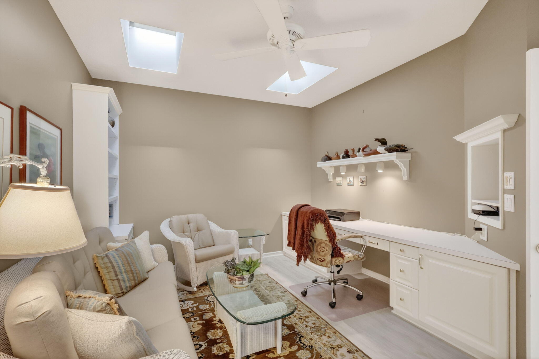 5422 Southeast Meredith Terrace Stuart, FL 34997 - Photo 31 of 56 a living room with furniture and a chandelier