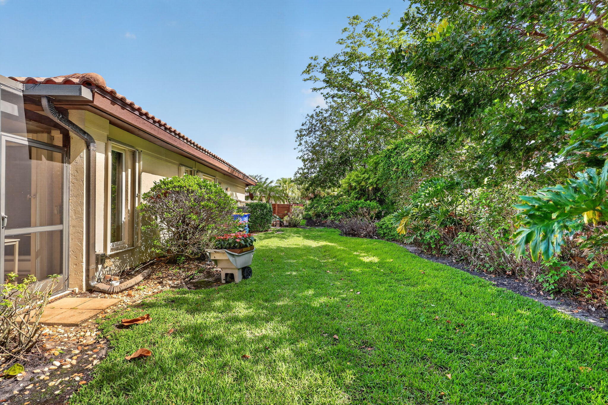5422 Southeast Meredith Terrace Stuart, FL 34997 - Photo 38 of 56 a view of a backyard with sitting area