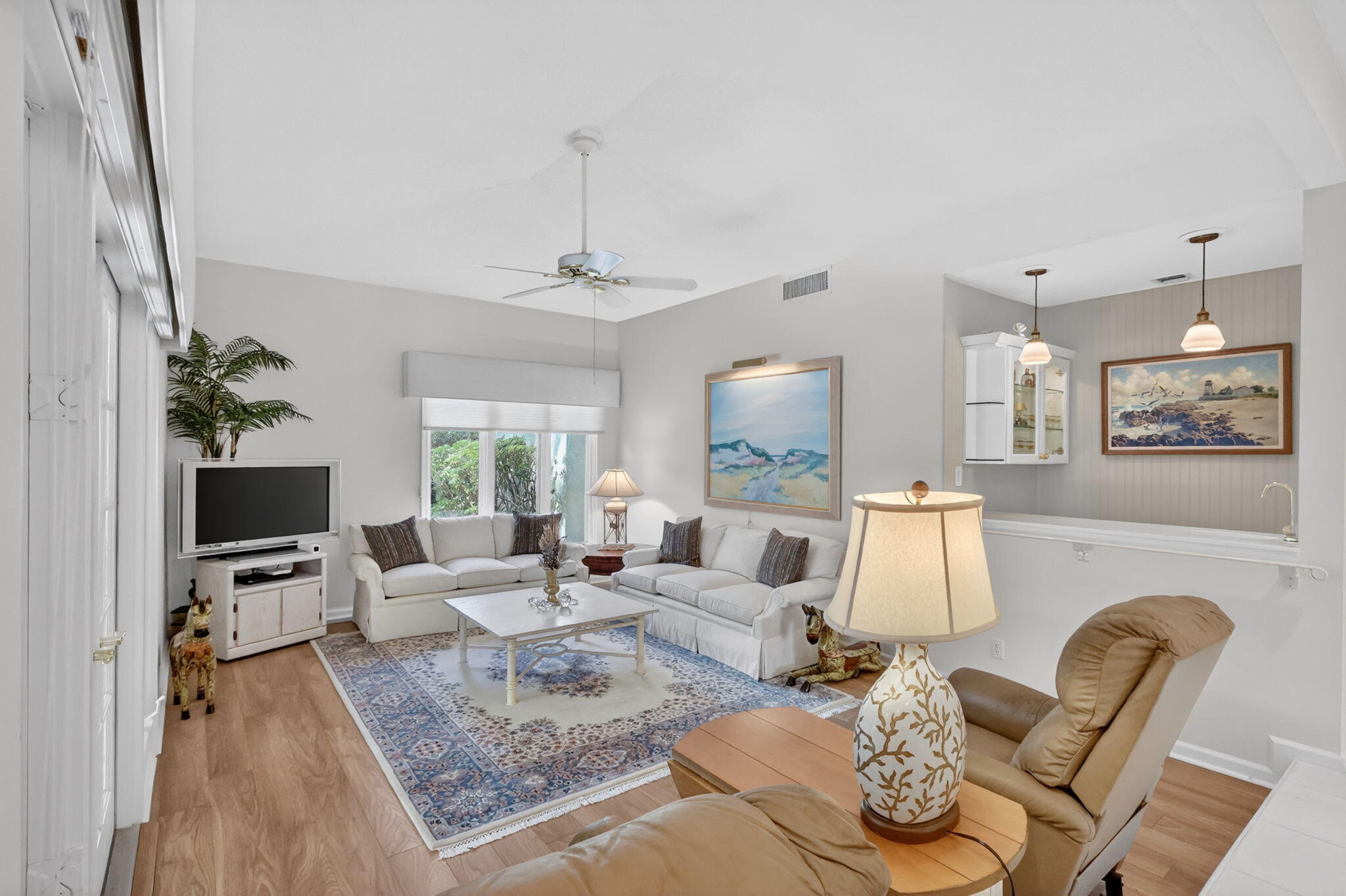 5422 Southeast Meredith Terrace Stuart, FL 34997 - Photo 8 of 56 a living room with furniture and wooden floor