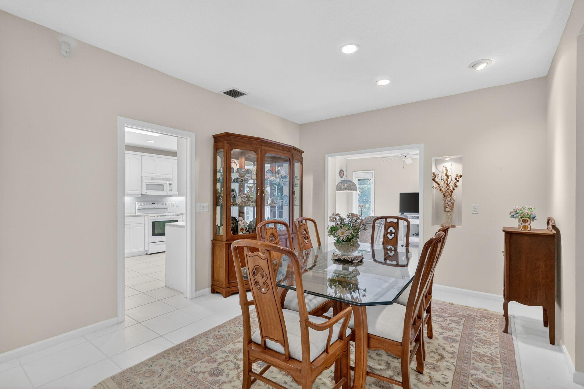 5422 Southeast Meredith Terrace Stuart, FL 34997 - Photo 10 of 56 a dining room with furniture and window