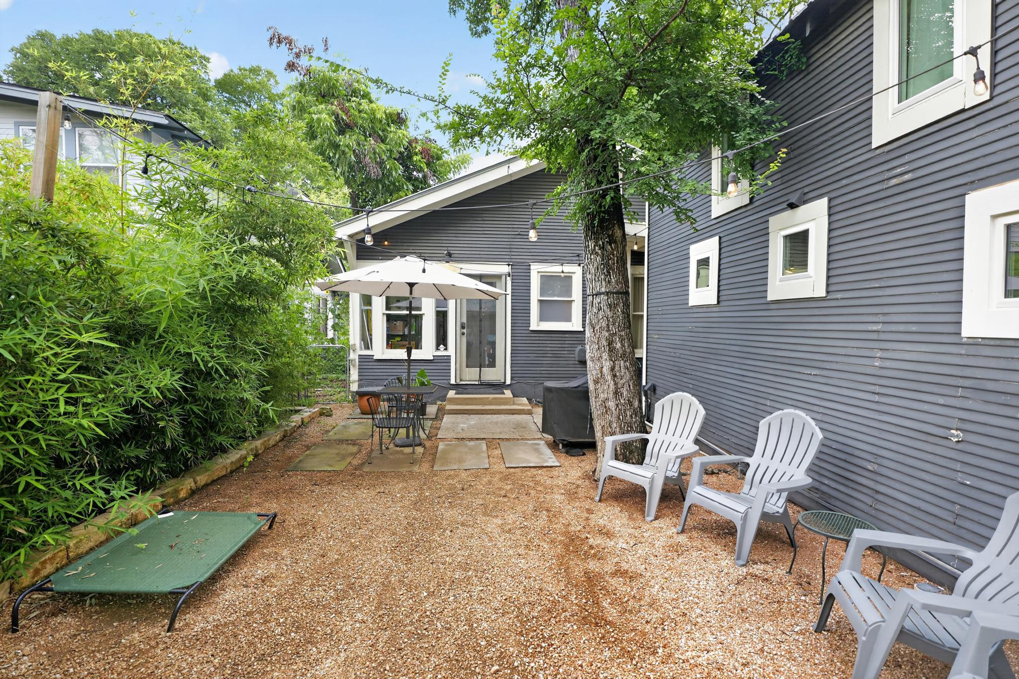 307 East 35th Street, Unit A Austin, TX 78705 - Photo 10 of 40 A private pea-gravel courtyard offers ample room for relaxation and outdoor entertaining.