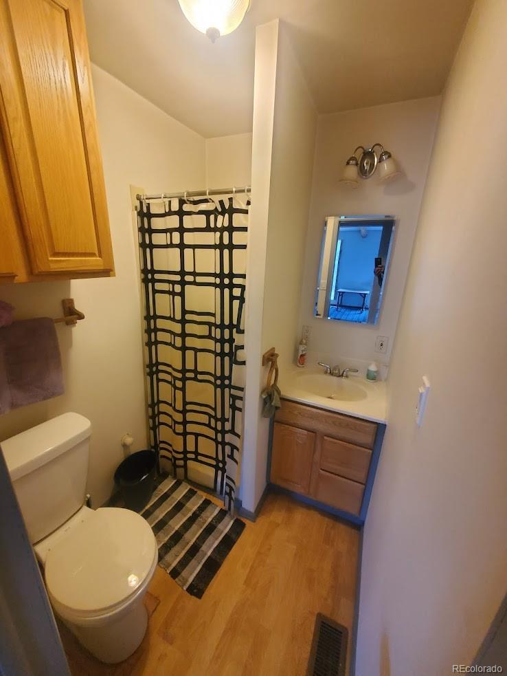 162 Green Street Bailey, CO 80421 - Photo 6 of 9 a bathroom with a sink toilet and shower