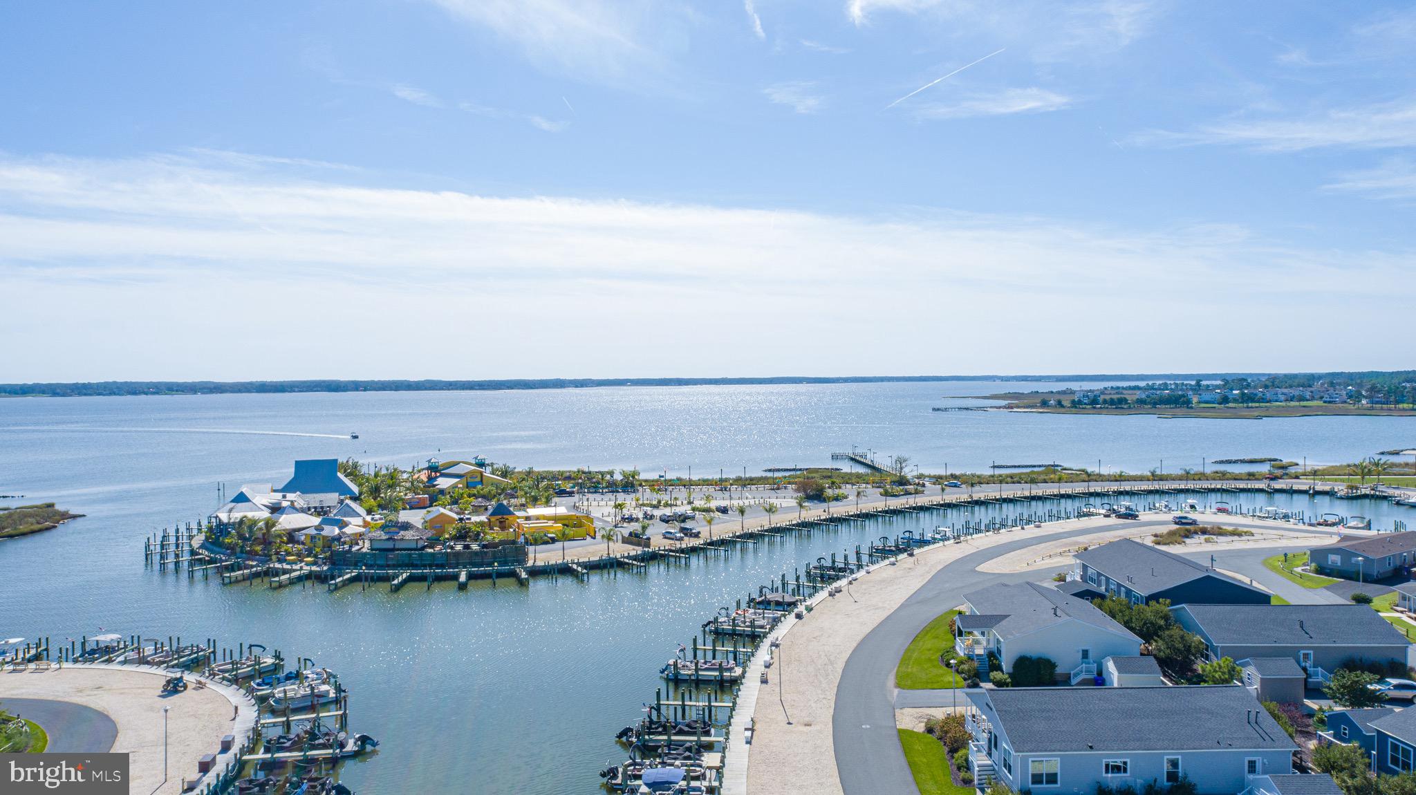 34340 River Road, Unit 129 Long Neck, DE 19966 - Photo 14 of 16 an aerial view of a house with a lake view