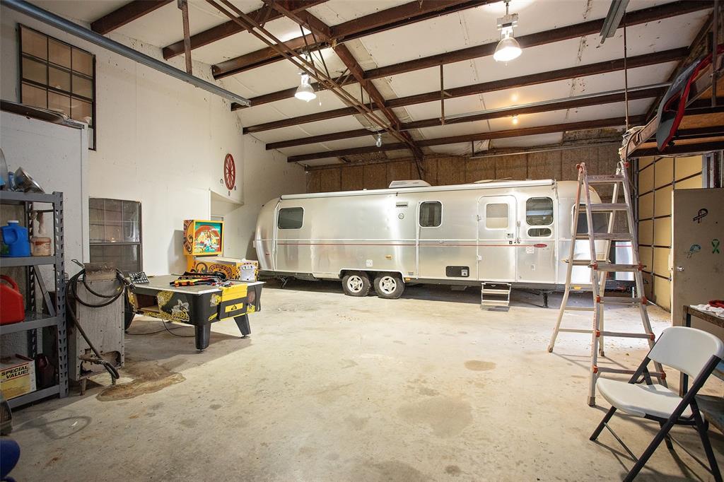 1193 Eastside Lake Road Graham, TX 76450 - Photo 16 of 38 a view of a patio with table and chairs